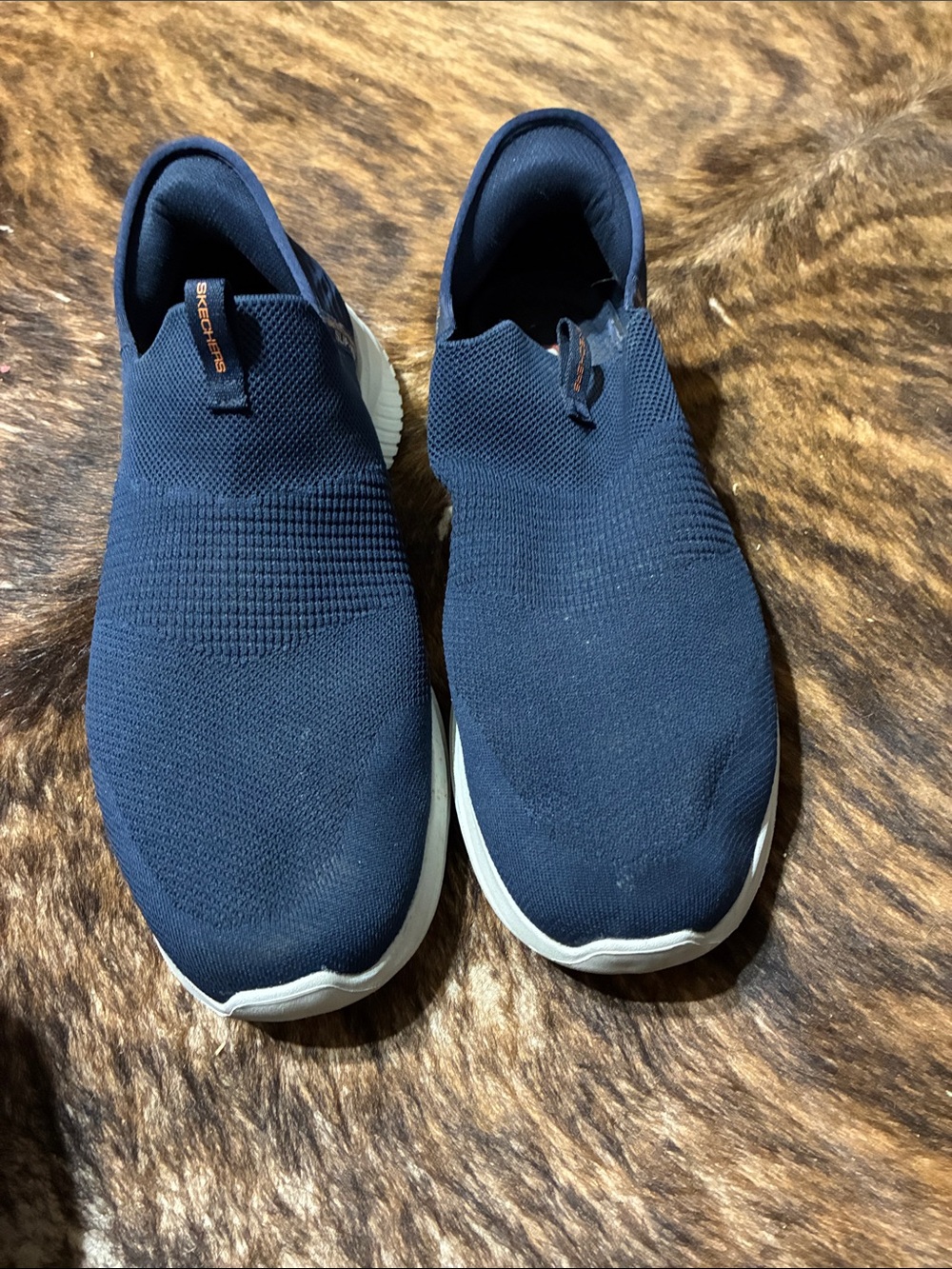 Sketchers men’s blue slip in shoes in size 12.